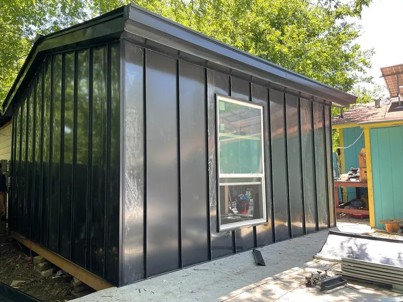Black standing seam metal wall panels for Roof Inspection in Bay St. Louis