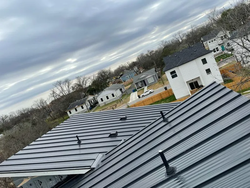 Standing seam metal roof panels with vents for Skylight Repair in Bay St. Louis